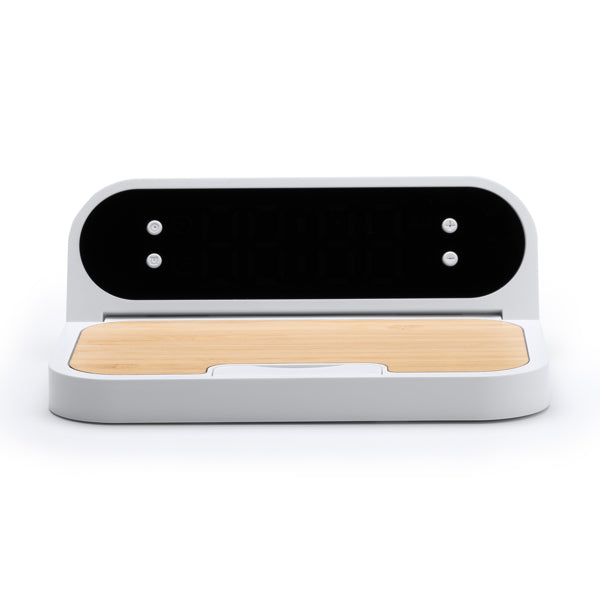 The wireless charger made of bamboo and ABS is a stylish and sustainable option to conveniently charge your devices